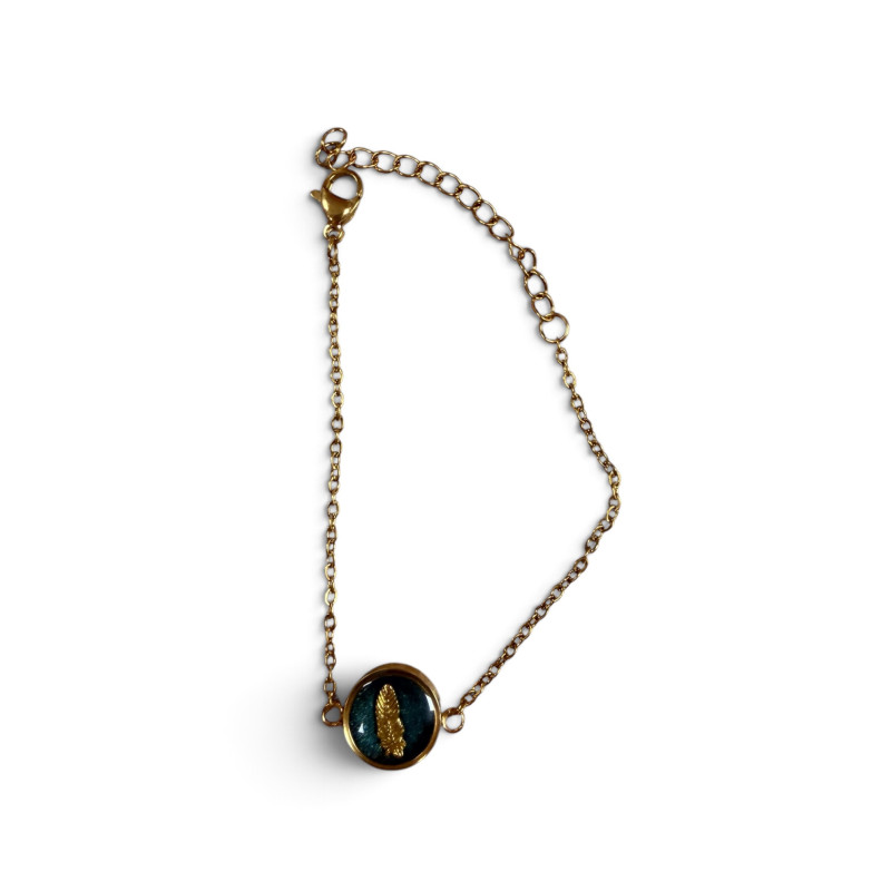 Bracelet bleu avec plume