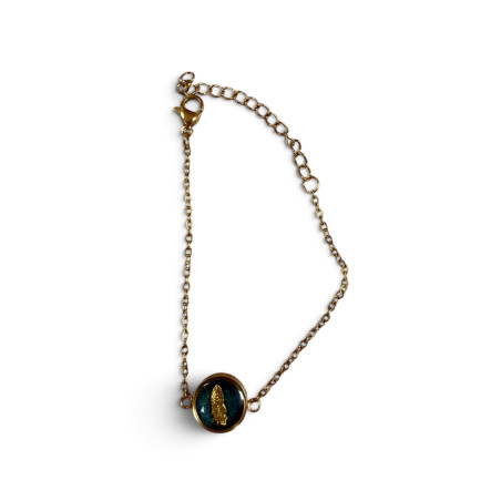 Bracelet bleu avec plume